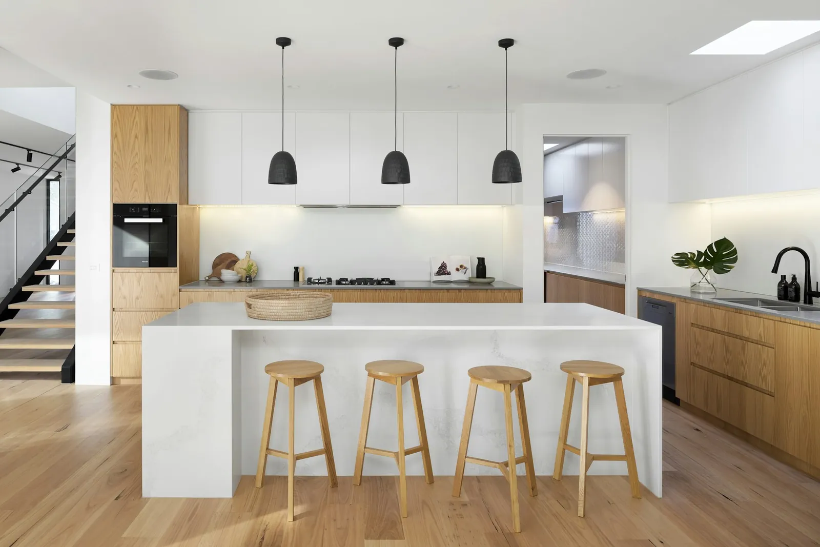 Representative image of a kitchen with island and pendant lights