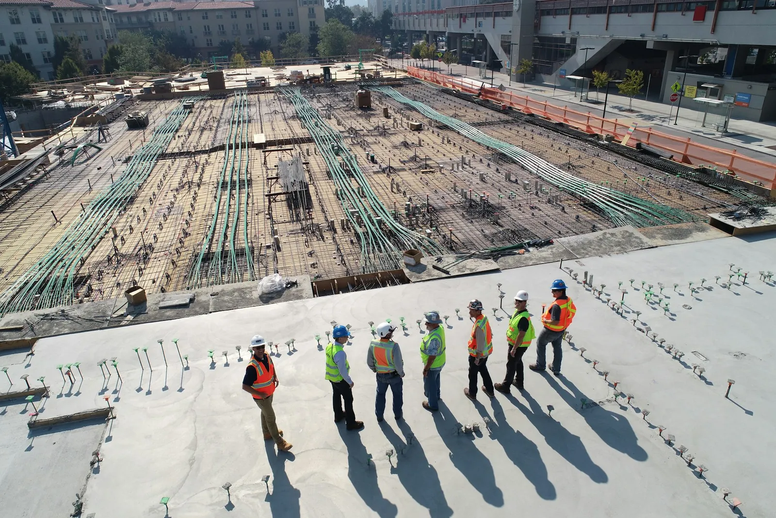 Representative image of an open construction site with a site team